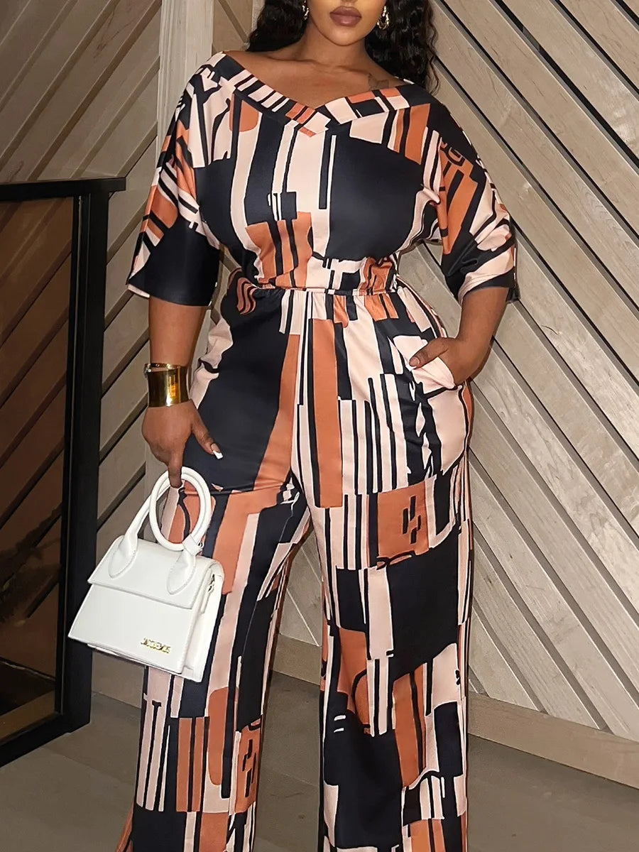 LW Plus Size Jumpsuit Elegant V Neck Mixed Print Jumpsuit with Pockets Comfortable Medium Stretch for Summer and Fall Seasons