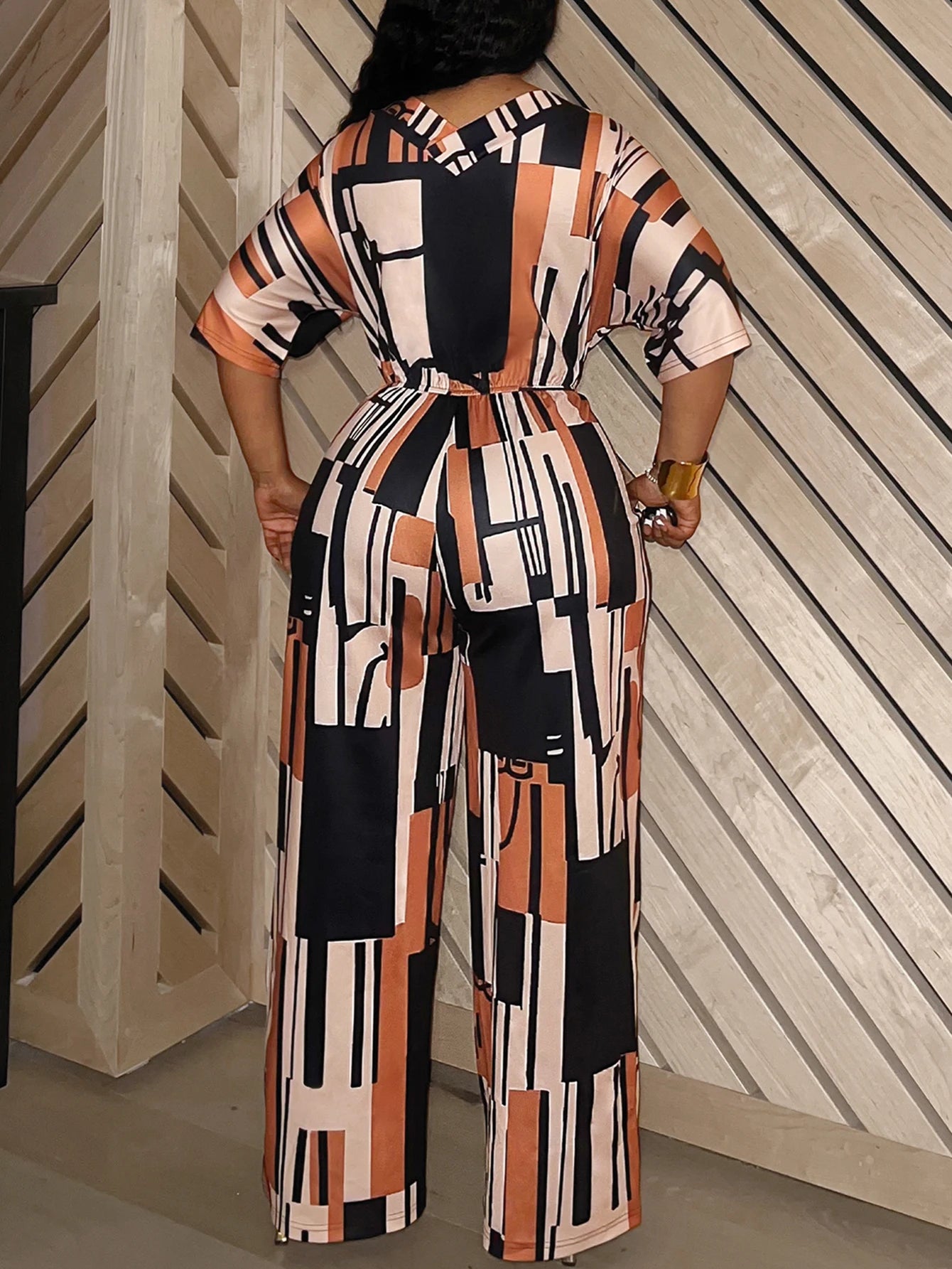 LW Plus Size Jumpsuit Elegant V Neck Mixed Print Jumpsuit with Pockets Comfortable Medium Stretch for Summer and Fall Seasons